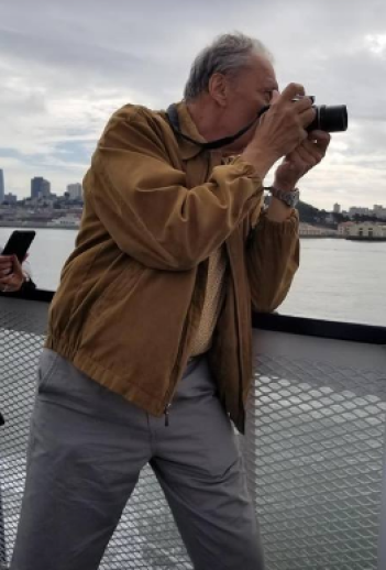 Roman capturing the beauty of San Francisco on our Bay Cruise.